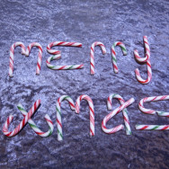 Cancy canes spelling out Merry Xmas